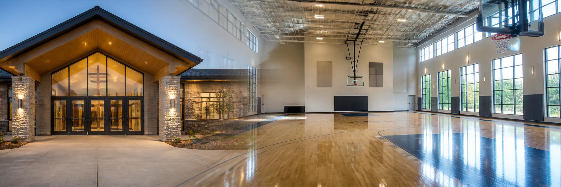 Front of a modern church and basketball court